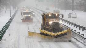 Snowplows clear snow from Storrow Drive during Boston's first major snowstorm of 2026. (Robin Lubbock/WBUR)
