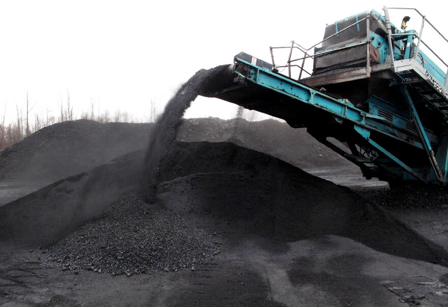 A coal separator sorts and piles up coal at the Tams mountaintop removal mine near Beckley, W.Va. The mine is operated by Southern Coal Corp., which is owned by Jim Justice.