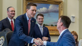Lieutenant Governor Matt Pinnell shakes hands with Governor Kevin Stitt moments before last year's State of the State Speech, Feb. 6, 2023, at the Oklahoma State Capitol. That summer, Stitt appointed Pinnell as Secretary of Workforce Development.
