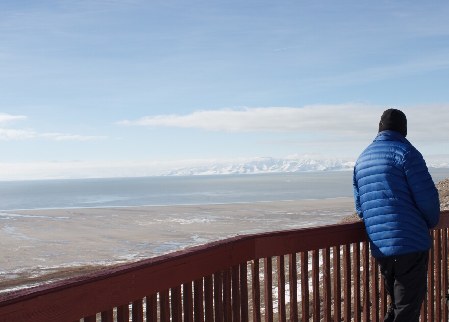 Kevin Perry looking south at a waterline of the Great Salt Lake.