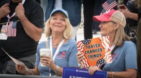 Two women at a rally for Amy Coney Barrett outside the U.S. Supreme Court on Sept. 26.