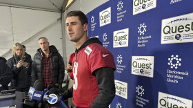 FILE - New York Giants NFL football quarterback Daniel Jones speaks to the media Nov. 21, 2024, in East Rutherford, N.J. (AP Photo/Tom Canavan, File)
