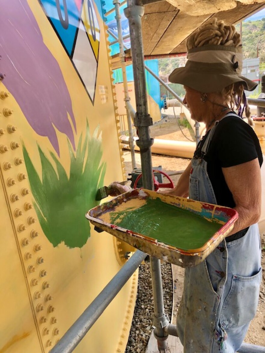 Artist MB Hanrahan says her gigantic mural off of Highway 33 in West Ventura will be done in August.