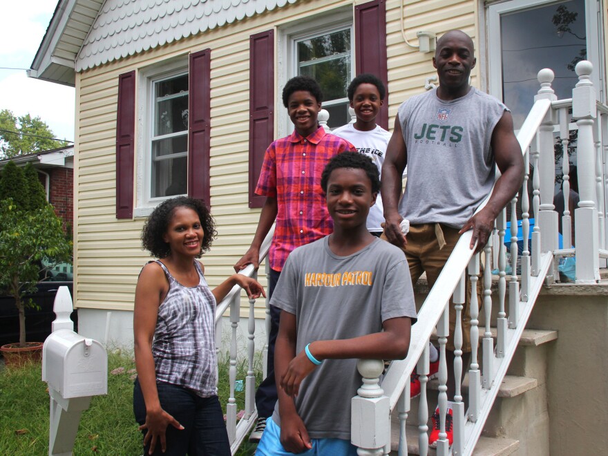 Monique Coleman and her family spent years in this house in Woodbridge, N.J., enduring floods that filled their basement with water. Now the state of New Jersey, using federal funds, has bought their home, and they've moved to a less vulnerable area.