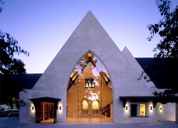 Exterior View of New Lobby Addition at Dusk