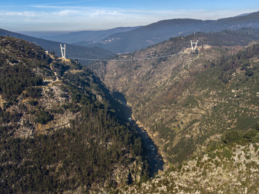 Local authorities say they hope the pedestrian suspension bridge will boost the economy by enticing locals to stay and tourists to visit.