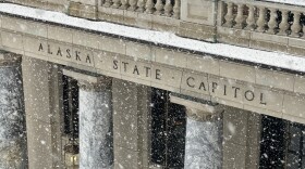 Snow falls on the Alaska State Capitol 