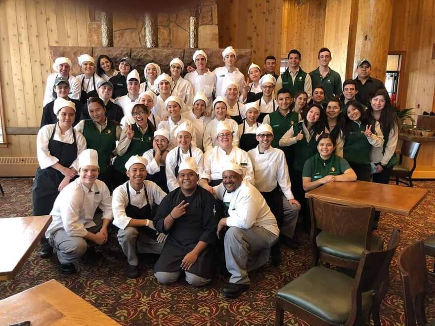 While working as a cook for one of the lodges at Deer Valley, José Pablo Valerio (second row, one from right) worked with about 40 other seasonal employees who had J-1 visas.