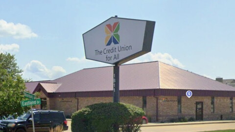 The exterior of a bank. specifically, Credit Union For All's location on Eastland Drive in Bloomington.