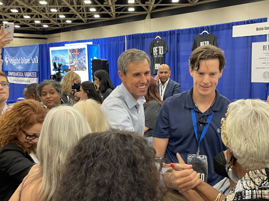  Beto O'Rourke, the Democratic candidate running for governor, greets people during the 2022 Texas Democratic Party convention in Dallas. 