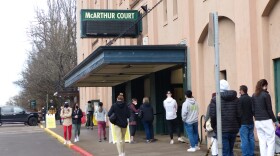 Lines stayed steady on the west side of U of O's McArthur Court for newly offered symptomatic COVID-19 testing.