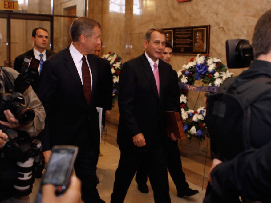 House Speaker John Boehner arrives for a House GOP caucus meeting on Wednesday.