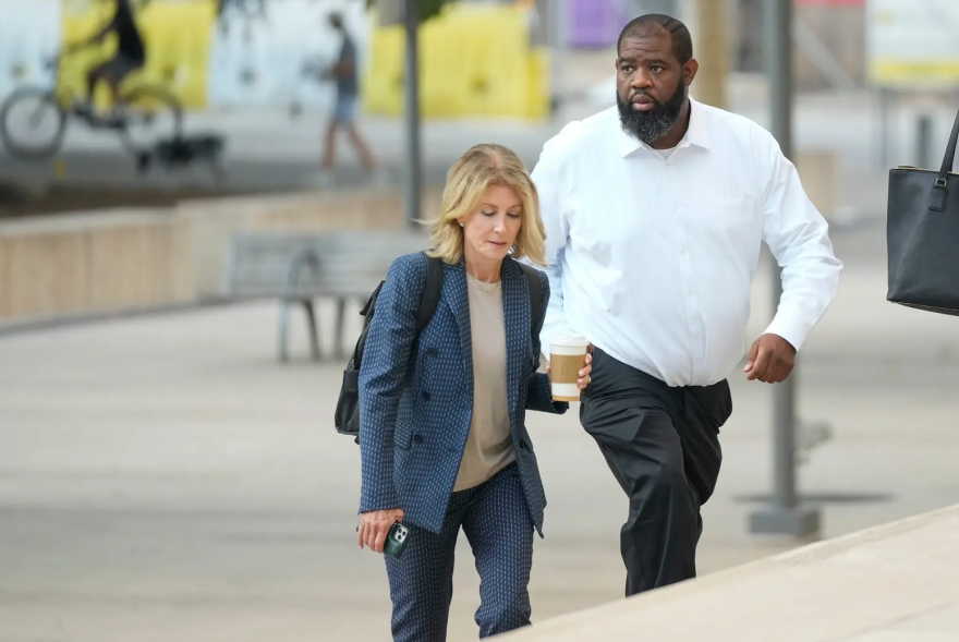 Former state Sen. Wendy Davis and bus driver Tim Holloway arrive at the U.S. Federal Courthouse for the "Trump Train" trial in downtown Austin on Sept. 12, 2024.