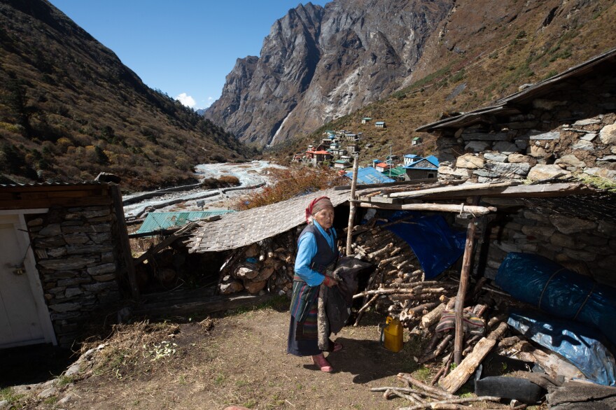 Nima Sherpa, 91, is the oldest person living in Beding, Nepal. When she was a child, she says a large lake nearby didn't even exist. But as glaciers melt in the mountains, the lake has swelled and transformed life here by threatening the town with flooding.