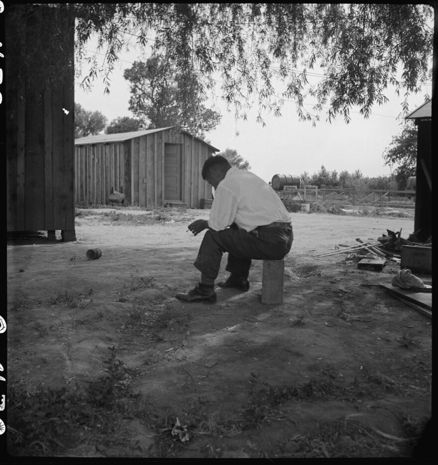 Tenant farmer in Woodland, California, on May 20, 1942, who has “just completed settlement of their affairs,” according to the original War Relocation Authority caption. “Everything is packed ready for evacuation on the following morning to an assembly center.”