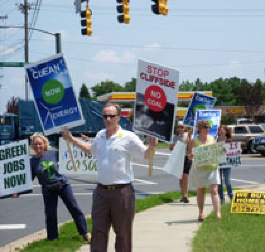 Protestors opposed to new coal plants on hand for Secretary Chu's Charlotte visit. hspace=4