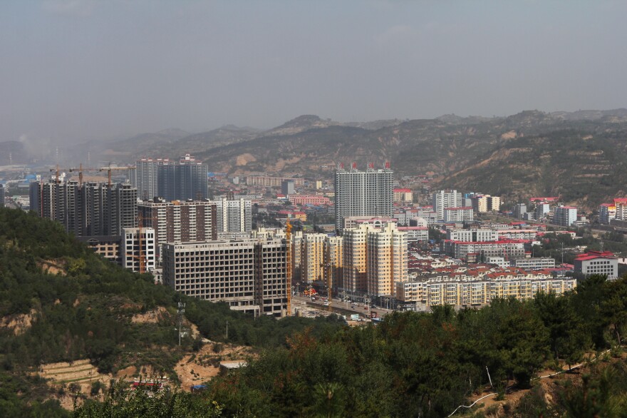 Luliang is in recession, but developers continue to build apartment blocks even though demand for real estate is drying up.