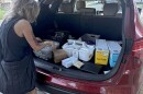 Harm reduction worker Suzanne Smith loads up her SUV with supplies in Birmingham, Alabama, on April 6, 2025.