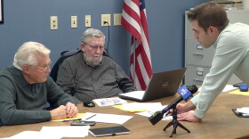 Spencer Pride President Jonathan Balash (right) discusses event plans with Spencer Town Council President Mike Spinks (left) and Councilmember Dean Bruce (center) at the Council's Jan. 21 meeting.