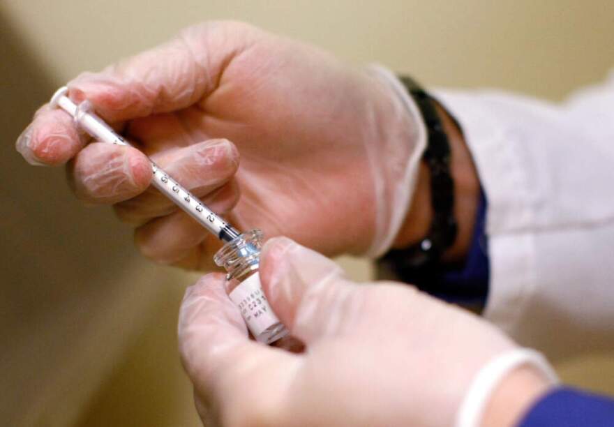 A doctor measure out a Botox injection. (Win McNamee/Getty Images)