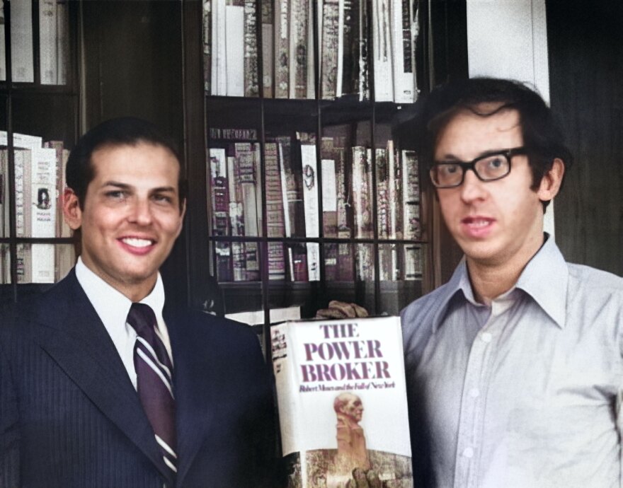 Writer Robert Caro (left) and editor Robert Gottlieb pose with Caro's Pulitzer Prize-winning biography of Robert Moses, "The Power Broker," published in 1974. The five-decade relationship between the writer and editor is the subject of a new documentary, "Turn Every Page: The Adventures of Robert Caro and Robert Gottlieb."