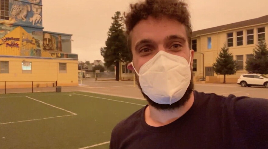 Patrick Messac, former science teacher at Life Academy, records a video lesson for his students about Bay Area air quality on the day the skies turned orange in September 2020.