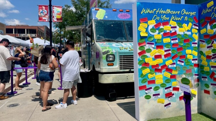 One Nation Overcharged, a national coalition working to raise awareness about health costs, invited people at the River Market Aug. 2 to take a free popsicle and answer the question, "What healthcare charges do you want to chill?"