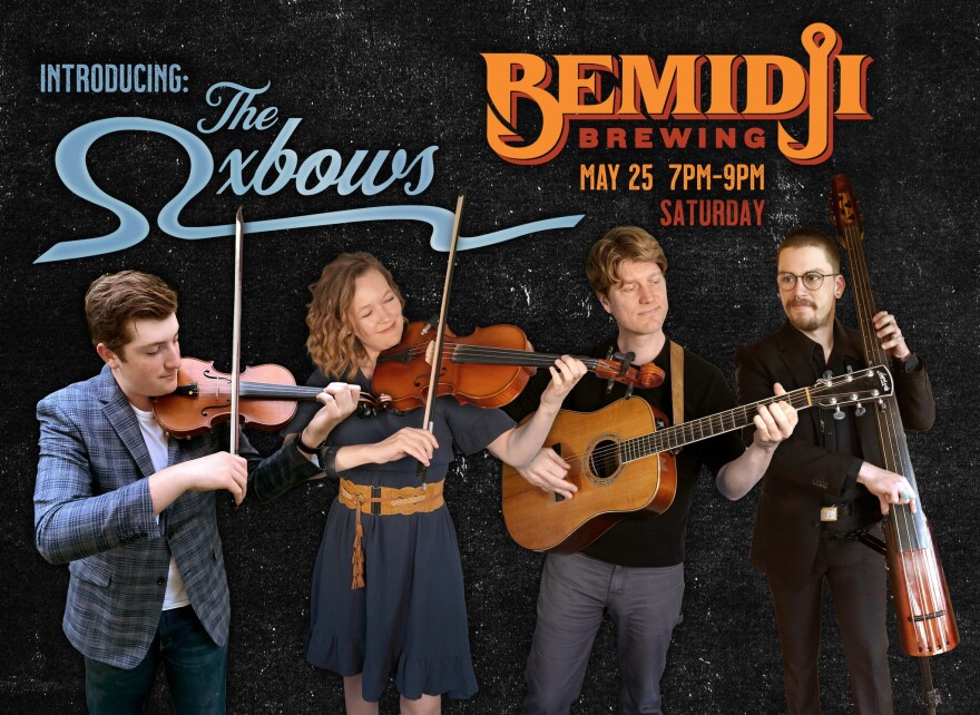 The four members of the band The Oxbows. From left to right there is two people playing violins then one playing guitar and one playing bass. 