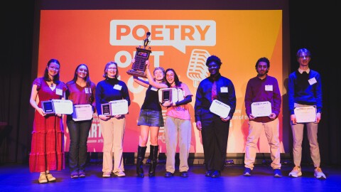 Poetry Out Loud state winner Natalia Gatti (holding trophy) with finalists at the competition in February 2026.