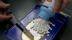 In this Friday, July 8, 2016, photo, pharmacist technician Irene Arrenquin fills a prescription for the anti-diarrhea drug diphenoxylate hydrochloride and atropine sulfate at Pucci's Pharmacy, in Sacramento, Calif. The drug is one of several that has seen a significant cost increase in recent months. In an effort to discourage drugmakers from raising their prices too quickly or introducing new medications that are unaffordable to the average person, state Sen. Ed Hernandez, D-Azusa, has introduced legislation that would require drug makers to provide advance notice before making big price increases. (AP Photo/Rich Pedroncelli)