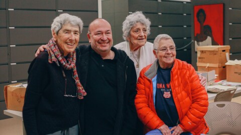 Liz Kennedy, far-left, Javier Bustillos, Madeline Davis and Bobbi Prebis pose for a picture during an event together.