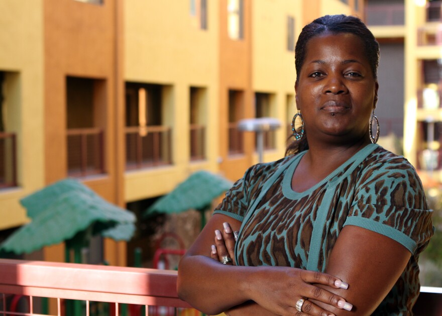 Felicia McMullen has lived in the energy-efficient Devine Legacy apartment building in Central Phoenix since December 2011.