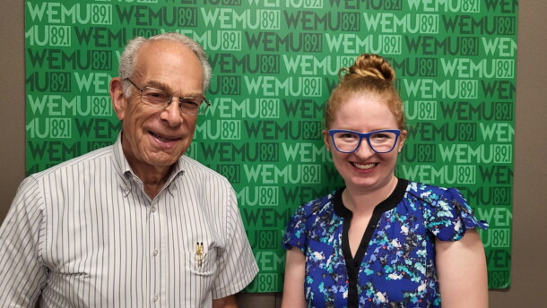 Norman Herbert and Madeline Garcia representing the Yvonne Fund at the Timko Broadcast Center.