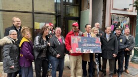 Officials and local business owners celebrate state funding to open a new space for Schenectady's Downtown Ambassadors program on Jay Street