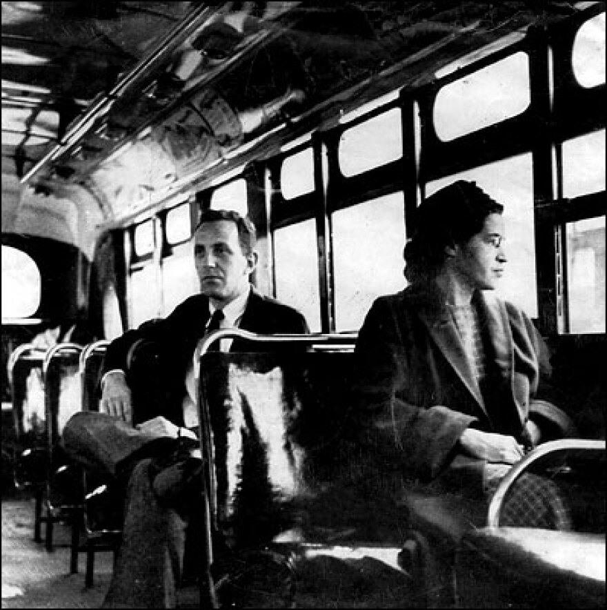 Rosa Parks on a Montgomery bus on December 21, 1956, the day Montgomery's public transportation system was legally integrated.