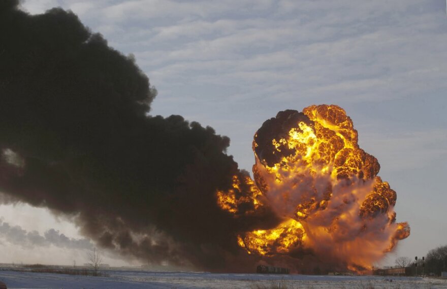 A fireball goes up at the site of an oil train derailment near Casselton, N.D. on Dec. 30, 2013. CREDIT: AP Photo/Bruce Crummy, File