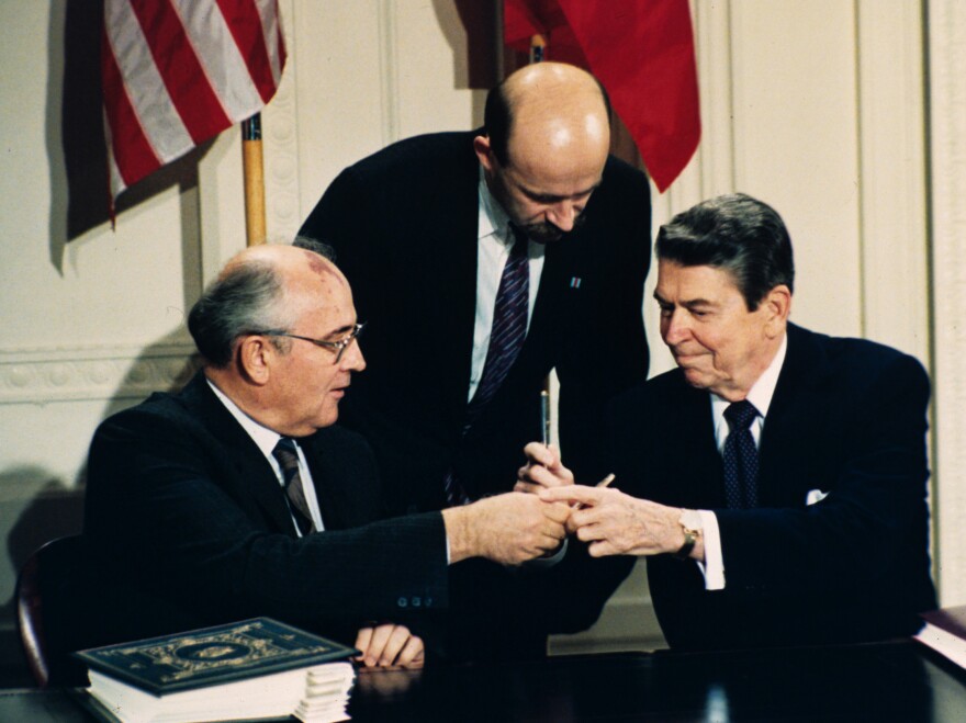 In this Dec. 8, 1987, file photo, President Ronald Reagan, right, and Soviet leader Mikhail Gorbachev exchange pens during the Intermediate Range Nuclear Forces Treaty signing ceremony in the White House East Room in Washington, D.C.