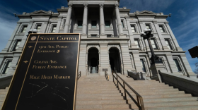 Outside the Colorado Capitol building with a look at the steps leading to the entrance.