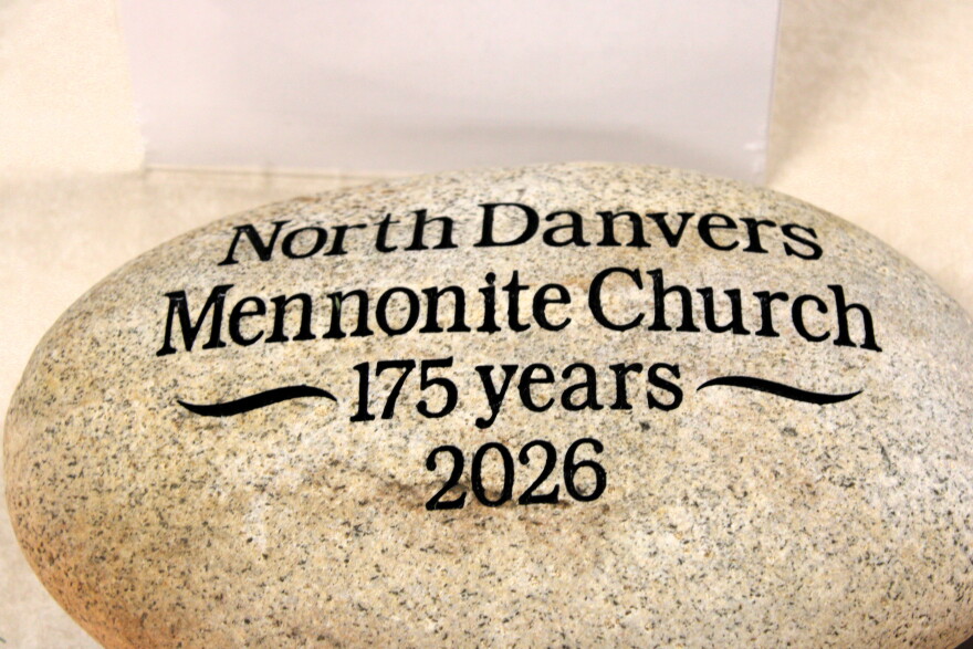 A stone engraved with “North Danvers Mennonite Church 175 years 2026” in black lettering, marking the church’s anniversary.
