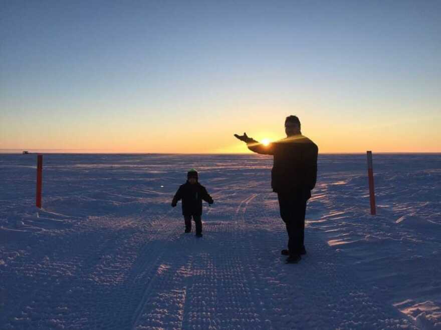Locals watch the sun rise in Utqiagvik. The community, as well as the rest of the North Slope Borough, has had all travel suspended as concerns over the coronavirus grow. (Photo by Ravenna Koenig/Alaska’s Energy Desk)