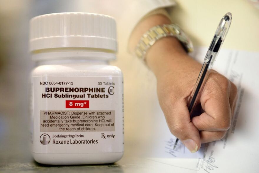 A physician writes a prescription for buprenorphine. 