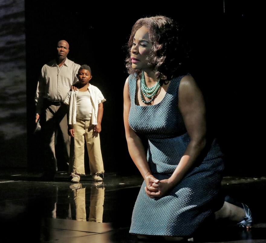 (From left) Arthur Woodley as Emile Griffith, Jordan Jones as Little Emile Griffith and Denyce Graves as Eelda Griffith