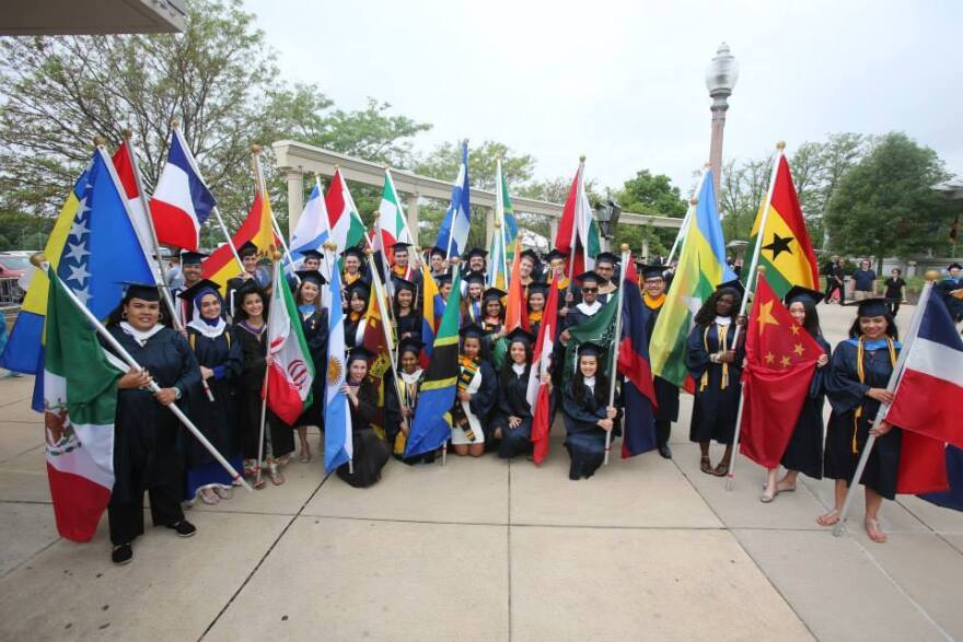 International students celebrate graduation day in 2015.