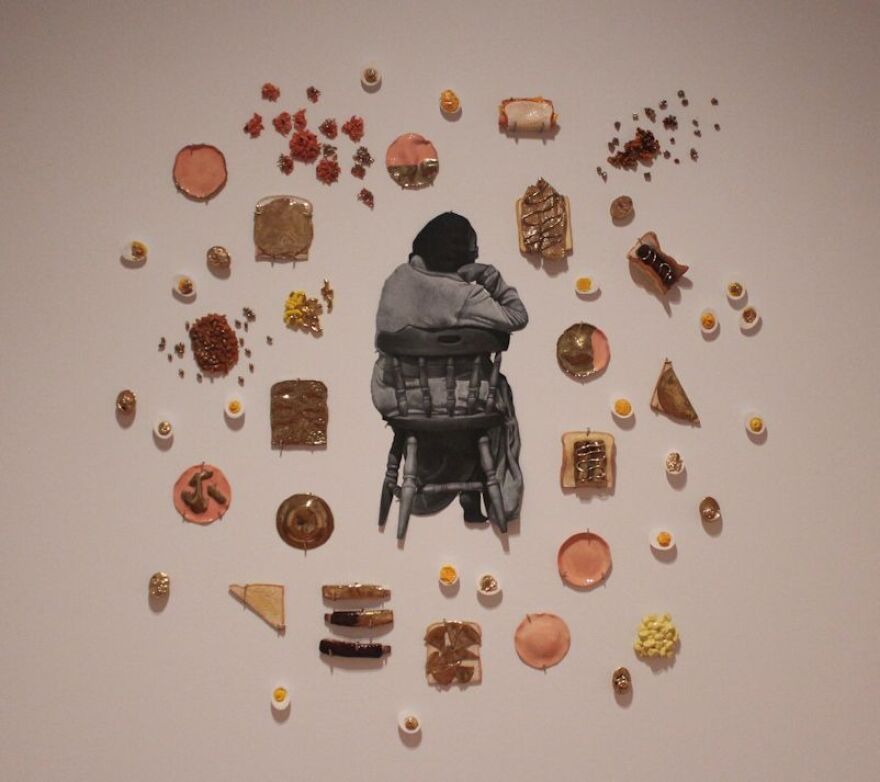 Drawing of artist's mother surrounded by ceramic pieces that depict various items of soul and comfort food.