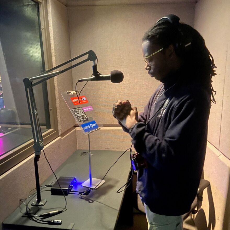 Young student in a recording booth at BTPM