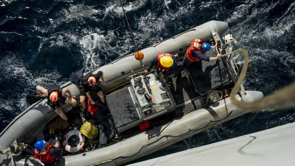 U.S. Sailors from the Iwo Jima Amphibious Ready Group, return after responding to a man overboard training evolution in a rigid-hull inflatable boat launched from USS Iwo Jima while underway in the Caribbean Sea.