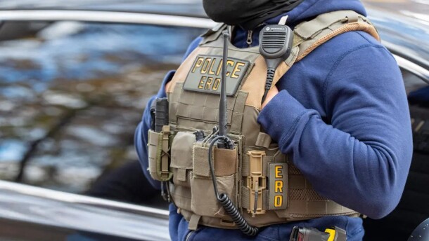 Federal law enforcement officers with Immigration and Customs Enforcement (ICE) and Enforcement and Removal Operations (ERO) conduct a traffic stop and detain people , in Washington on Monday, Nov. 17, 2025.