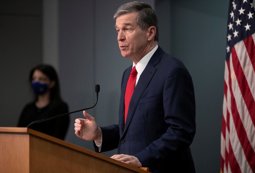 Gov. Roy Cooper speaks at a March 2, 2021, news conference about COVID-19.