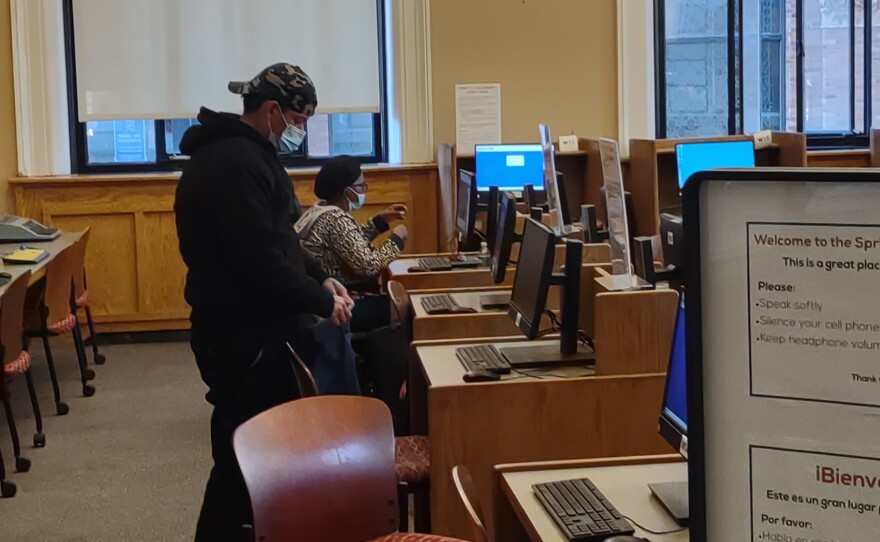 Users access free computers and Internet at central branch of Springfield Public Libraries