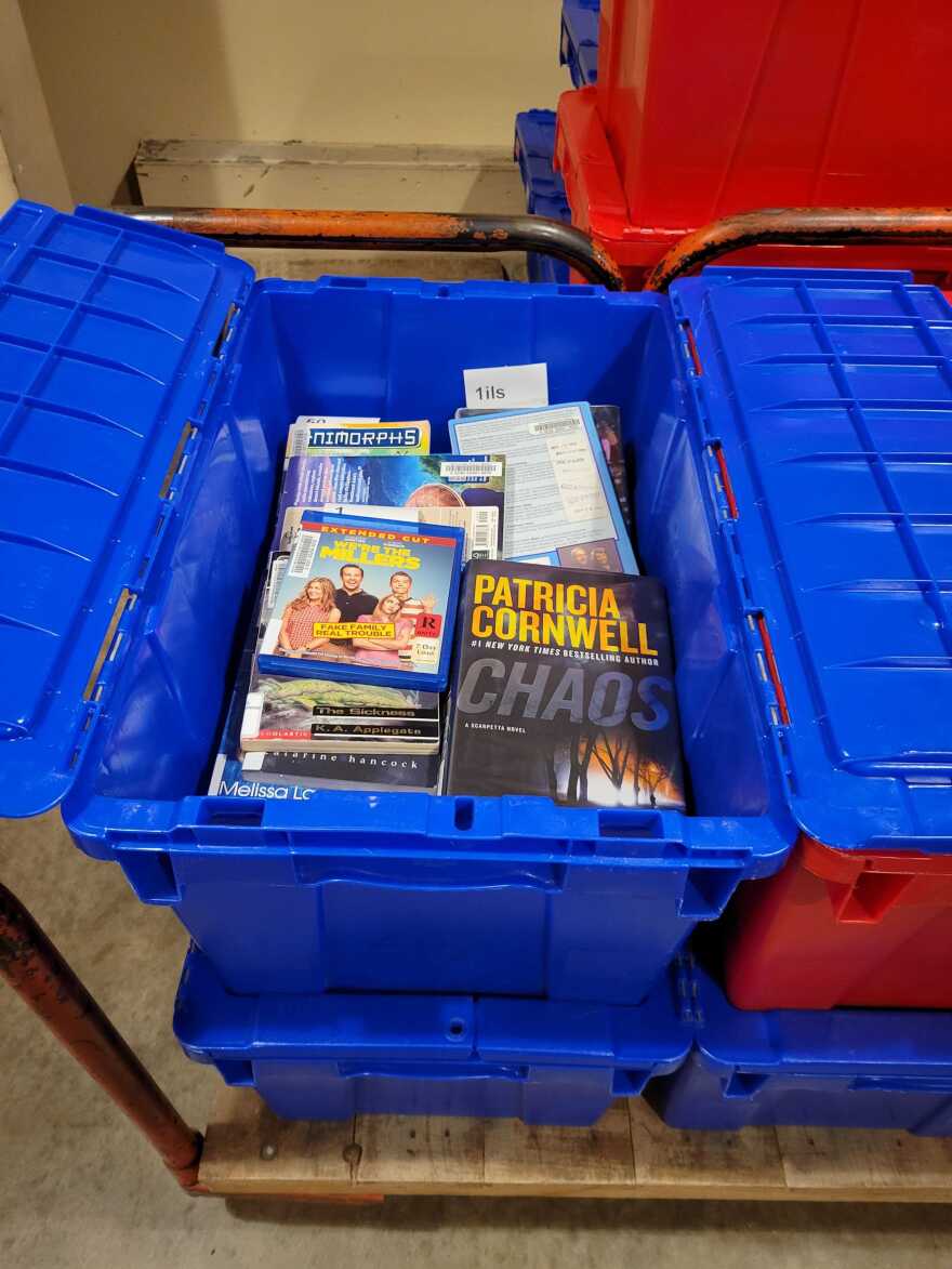 Action Logistics empties and fills these bins with hundreds of thousands of books and other materials from the Milwaukee County Library System.